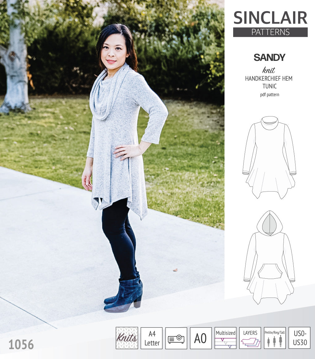 Sandy knit handkerchief hem tunic with a cowl, collar, hood and pockets ...
