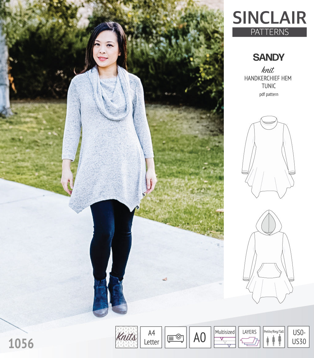 Sandy knit handkerchief hem tunic with a cowl, collar, hood and pockets ...