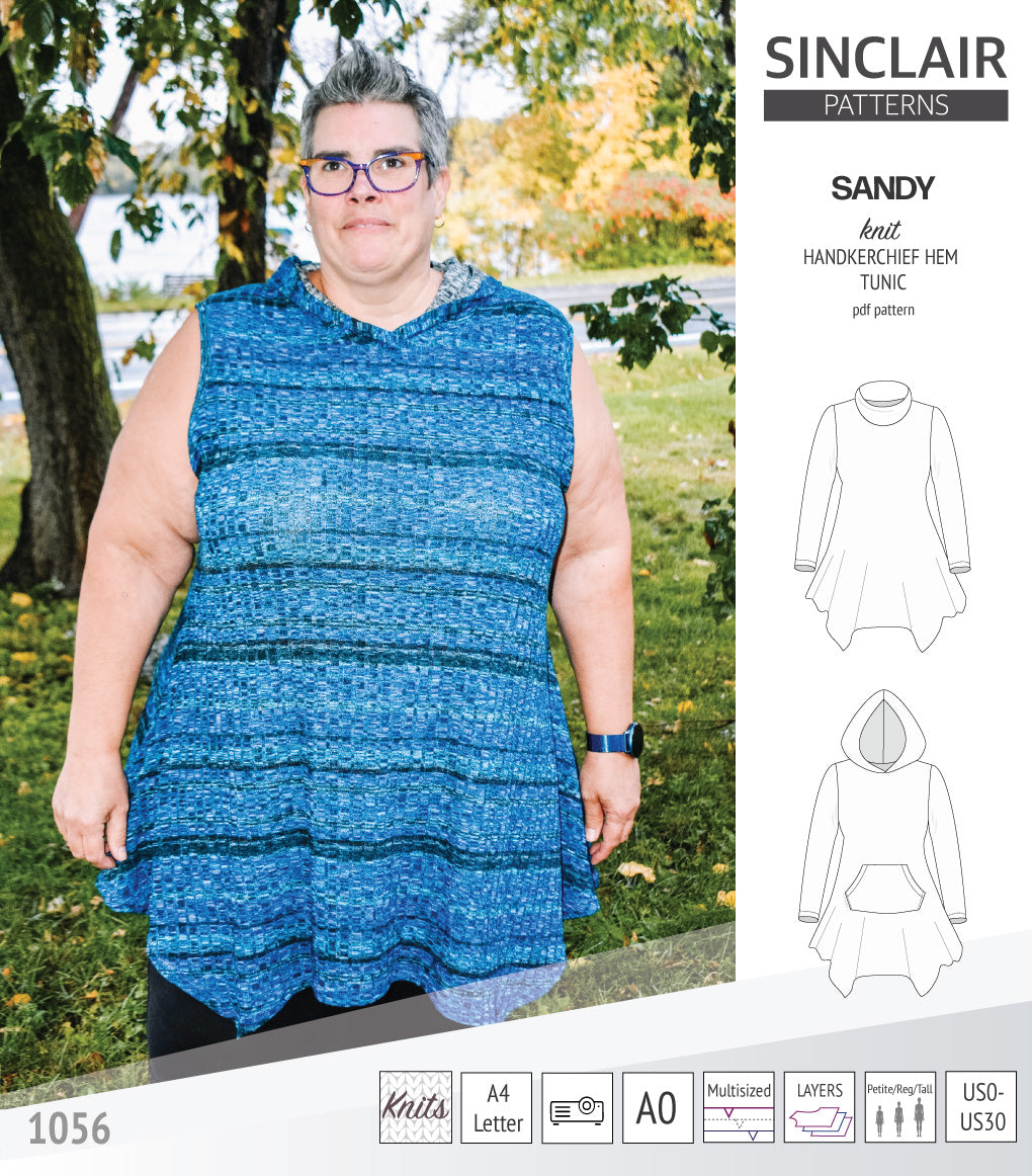 Sandy knit handkerchief hem tunic with a cowl, collar, hood and pockets ...